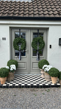 Load image into Gallery viewer, Boxwood wreath with black/wht stripe sash.